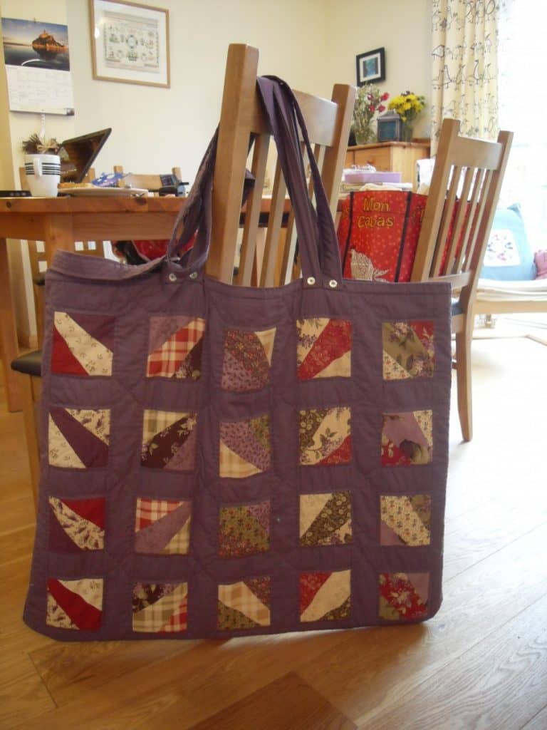 Quilted bag to hold patchwork cutting boards